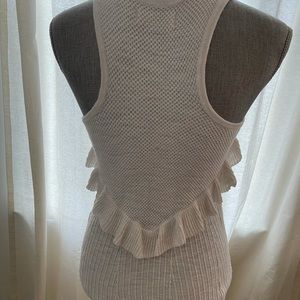 White sleeveless ruffle sweater tank